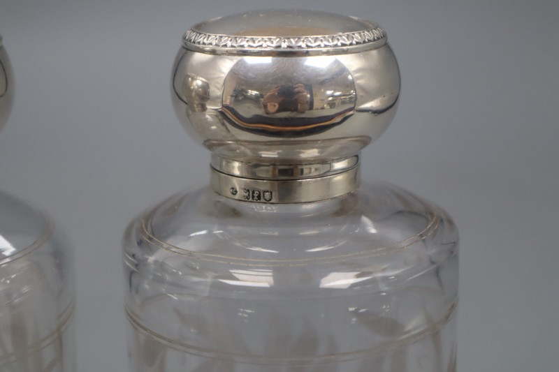 A pair of Edwardian silver mounted etched glass scent bottles, 16cm and a continental two handled vase